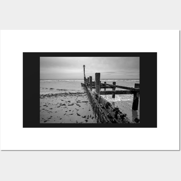 Wooden sea defences at low tide Wall Art by yackers1